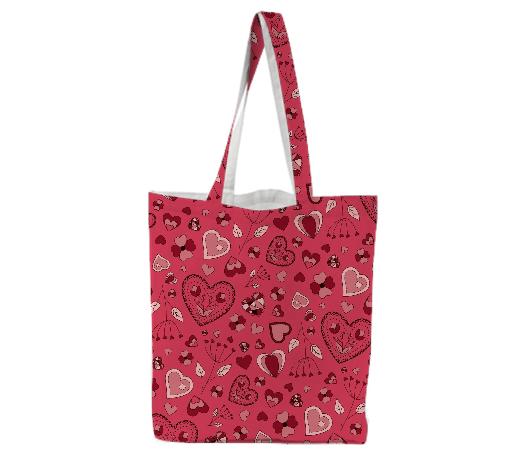 Pink flowers and hearts tote bag