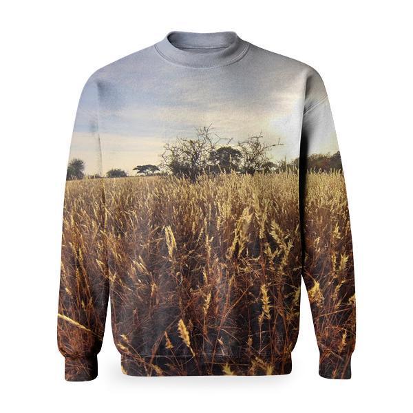 Man In Black Long Sleeve Shirt Holding Camera Tripod Walking On Wheat Fields At Daytime Basic Sweatshirt