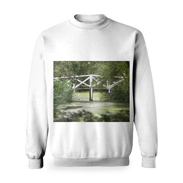 White Wooden Bridge On Body Of Water Surrounded With Green Leafed Trees During Daytime Basic Sweatshirt