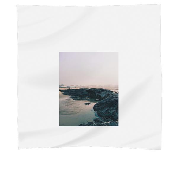 Rock Formation On Body Of Water Under White Foggy Weather Condition During Daytime Scarf