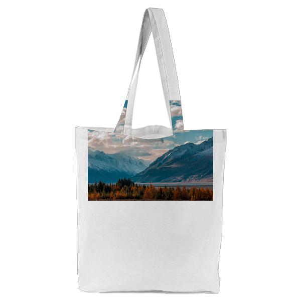 Snow Capped Mountains Under Blue Sky And White Clouds Tote Bag