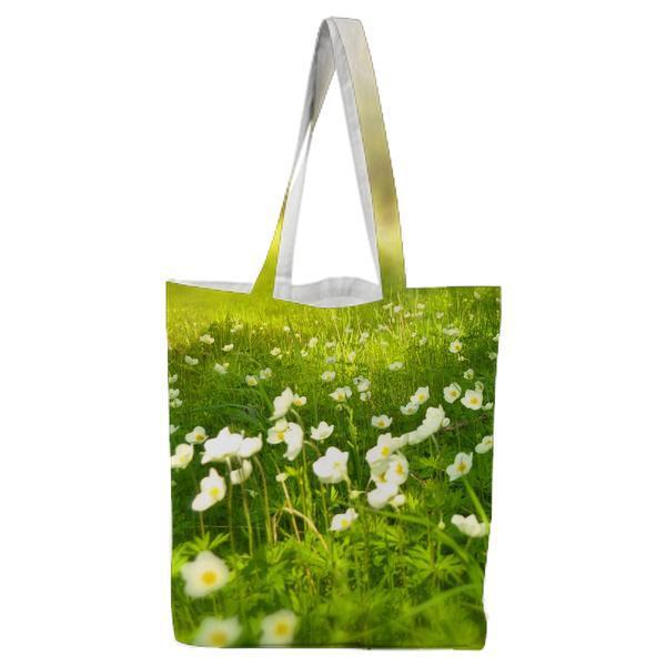 White Blooming Flower Under The Tree During Daytime Tote Bag