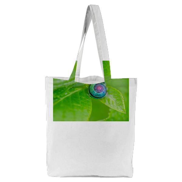 Green Pink And Blue Snail On Top Of Green Leaf Tote Bag