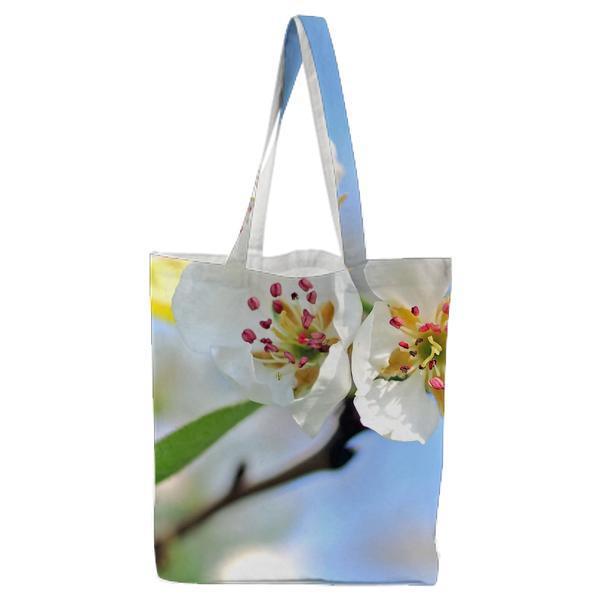 Closeup Photo Of White Petaled Flowers Red And Yellow Stigma Tote Bag