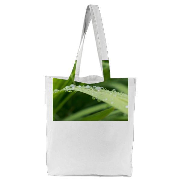 Green Grass With Water Droplets During Daytime Tote Bag