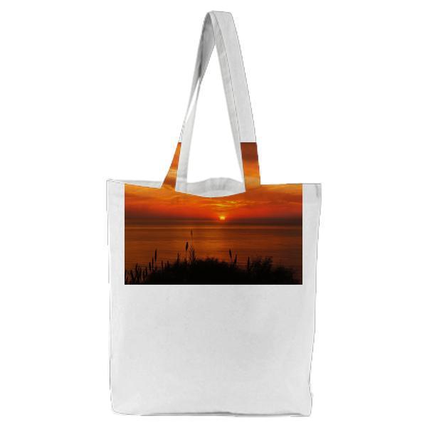 Hays Silhouette Near Ocean During Sunset Tote Bag