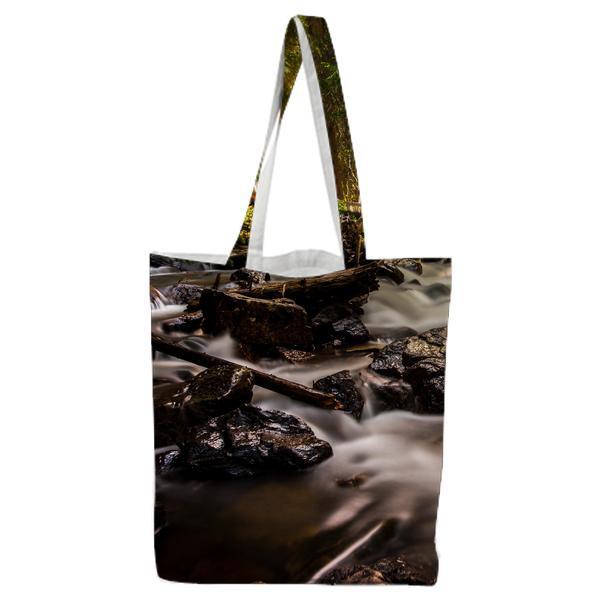 River With Woods And Rocks In The Forest During Daytime Tote Bag