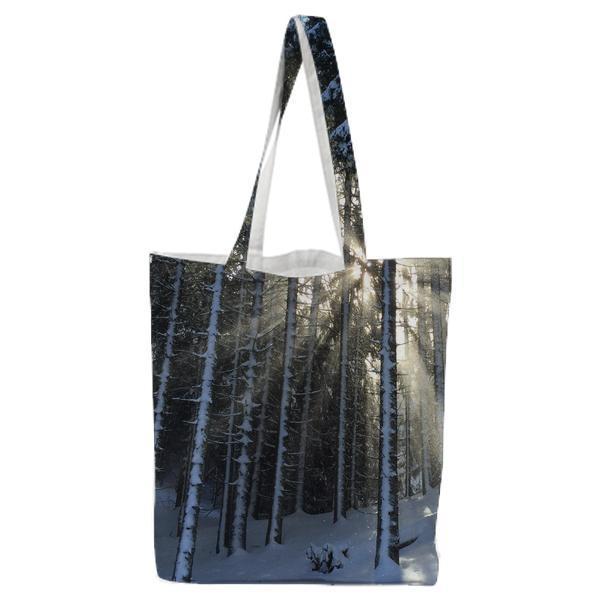 Snow Covered Trees On Snow Surface Tote Bag