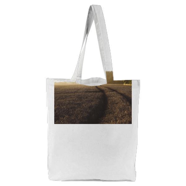 Grey Grass Fields During Golden Hour Tote Bag
