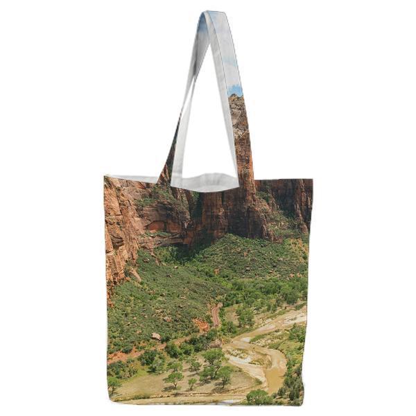 Photo Of Brown Mountain And Green Trees In Between During Daytime Tote Bag