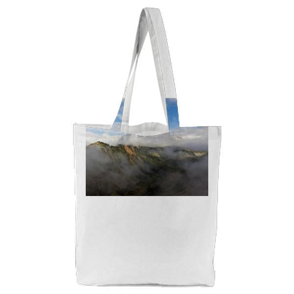Green Mountain Under White Clouds And Blue Sky Tote Bag