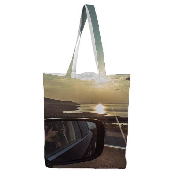 Body On Water Near Mountains Under Blue And White Cloudy Sky Tote Bag
