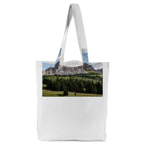 Green Pine Trees Near Gray Rocky Mountain Tote Bag