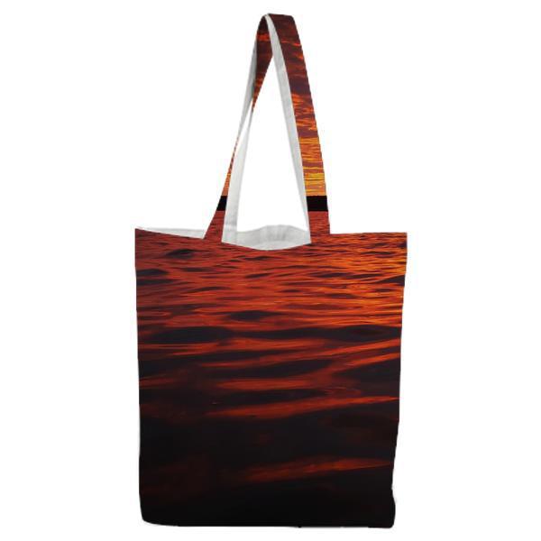 Sea Water Near Mountain During Sunset Tote Bag
