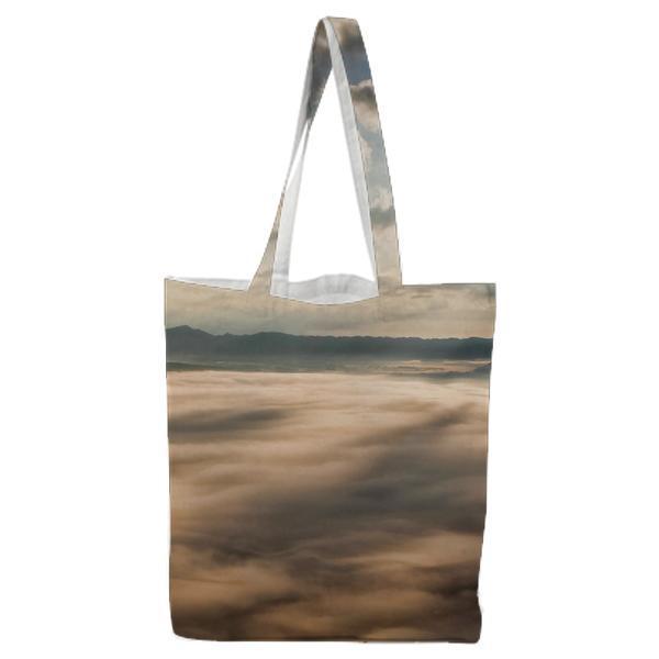 White Clouds With Sun Piercing Through It Tote Bag