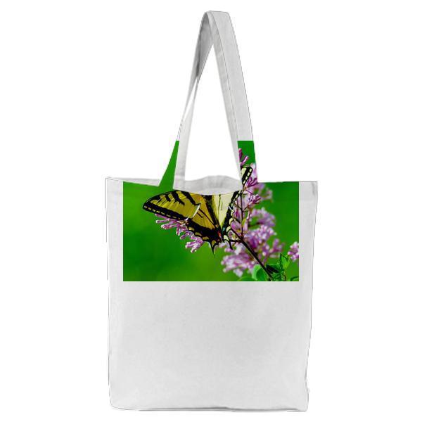 Yellow And Black Butterfly Perching On Purple Petaled Flower Tote Bag