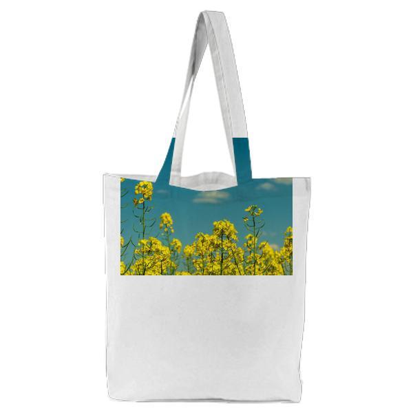 Yellow Flowers Under Partly Cloudy Skies During Daytime Tote Bag