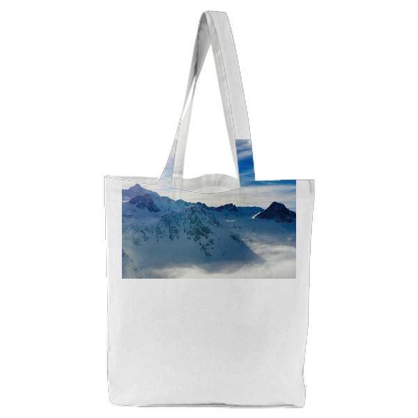 White Snow Covered Mountain Under Blue Sky Tote Bag