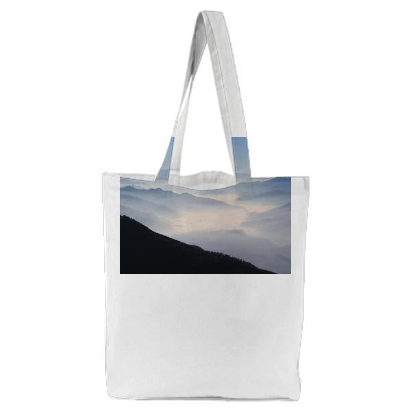 Silhouette View Of Mountain Under Bluesky And White Clouds During Daytime Tote Bag