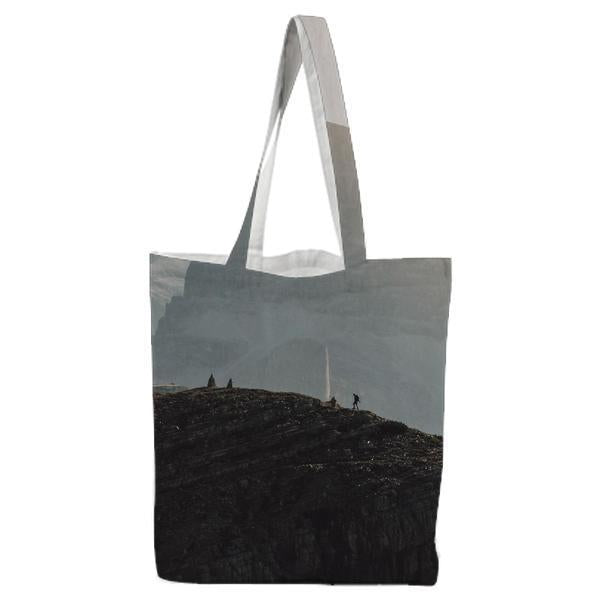Group Of People On Mountain During Daytime Tote Bag