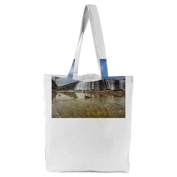 Waterfalls Near Hills Under Blue Sky And White Clouds Tote Bag