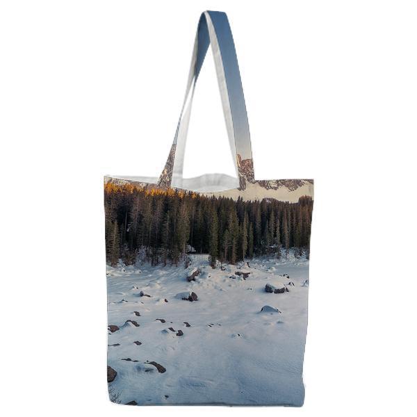 Body Of Water Surrounded By Snow Near Trees During Daytime Tote Bag