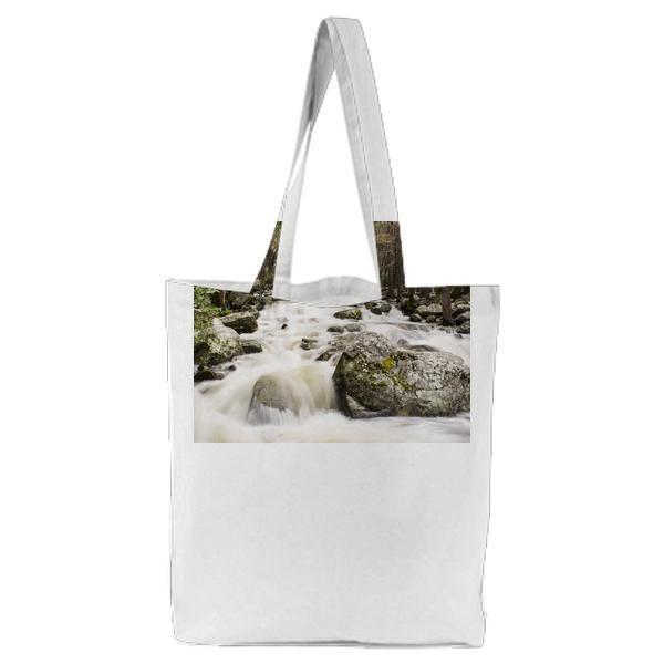 Rocks And Trees On Running Water Tote Bag