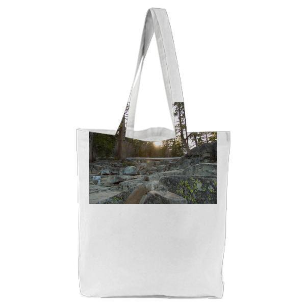 Green Leaf Tree And Rocks During Daytime Tote Bag