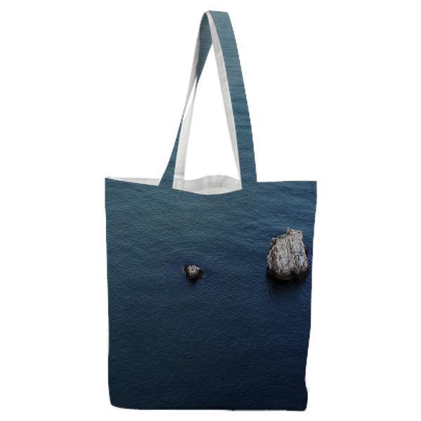 Rocky Mountain In The Middle Of Ocean During Daytime Tote Bag