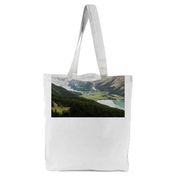Scenic View Of Mountains Against Cloudy Sky Tote Bag