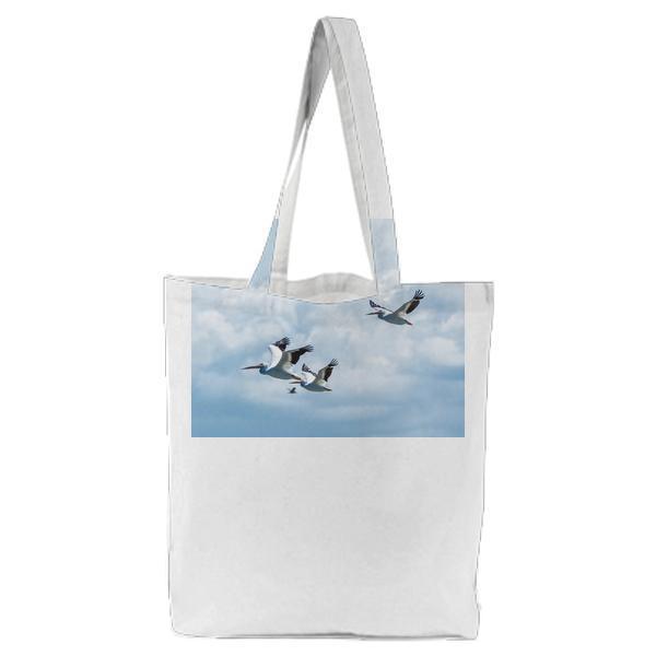 Group Of Birds Flying Under White Cloudy Sky Tote Bag