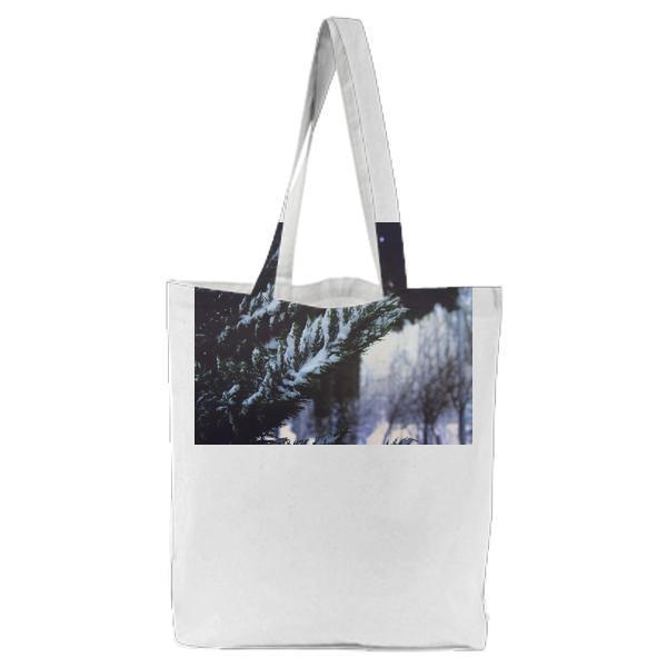 CloseUp Of Pine Trees In Forest During Winter Tote Bag