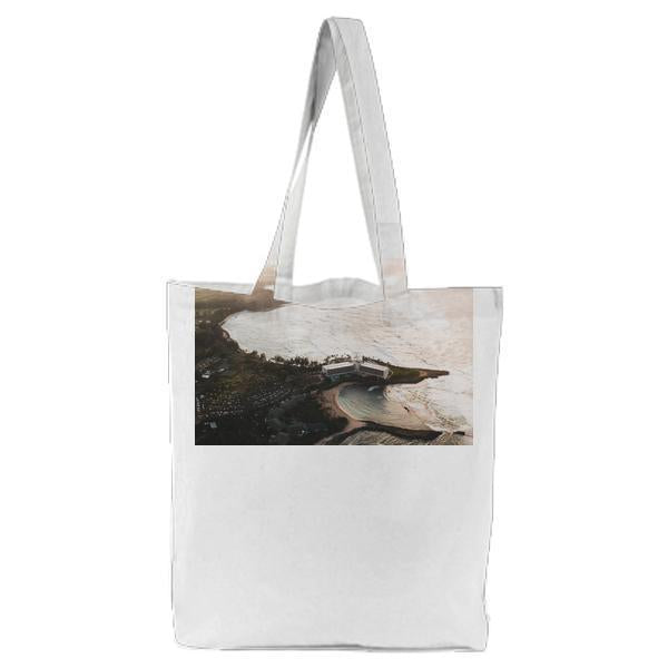 White House Near Seashore During Daytime Tote Bag