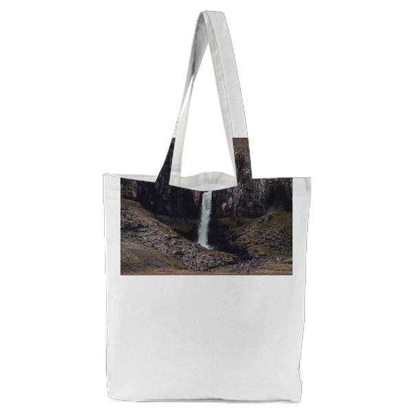 Waterfall Between Mountain Hill During Daytime Tote Bag