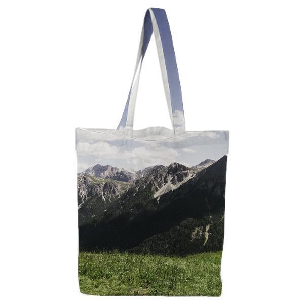 Mountains Under Cloudy Sky During Daytime Tote Bag