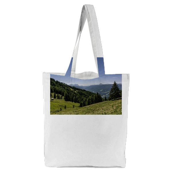 Pine Trees On Mountain Under Blue Sky During Daytime Tote Bag