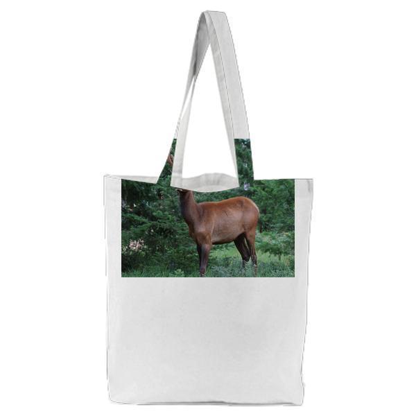 Brown Deer On Green Grass Field During Daytime Tote Bag