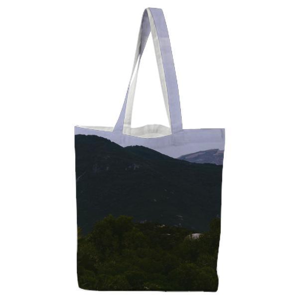 Tow People Standing On A Cliff Over Body Of Water During Daytime Tote Bag