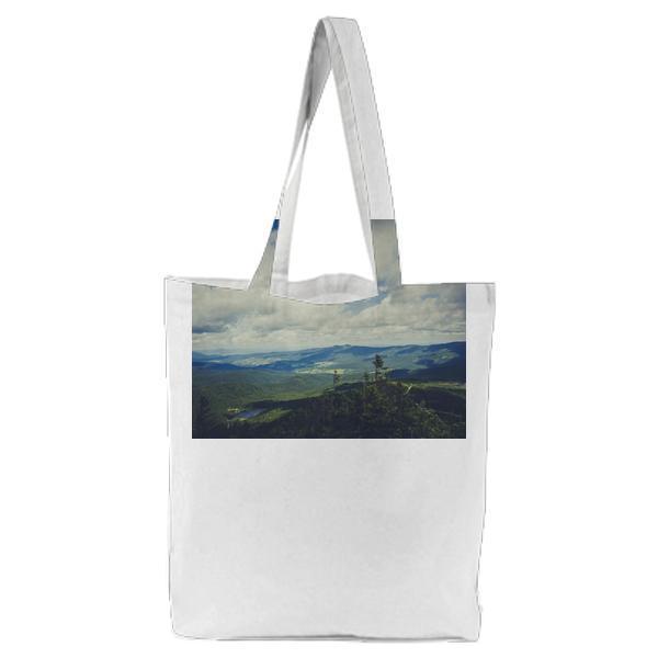 Green Mountain Under Cloudy Sky During Daytime Tote Bag