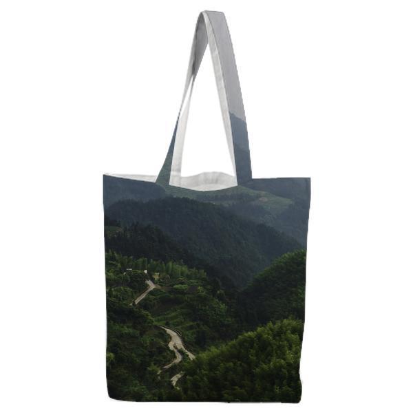 Green Leafed Plants And Tress On Hills During Daytime Tote Bag