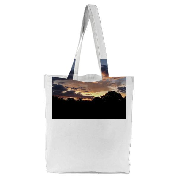 Black Forest Under Cloudy Sky During Sunset Tote Bag
