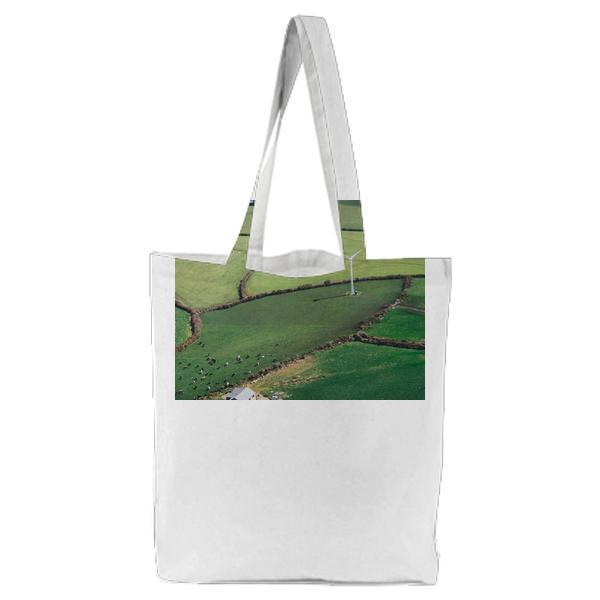 White Large Fan On Green Field During Day Time Tote Bag