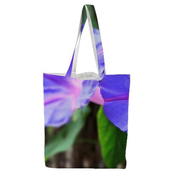 2 Blue Flowers During Daytime Tote Bag