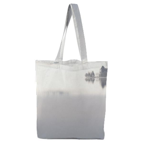 Silhouette Of Trees Reflecting On Body Water Tote Bag