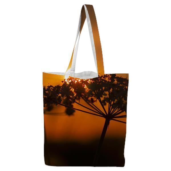 Silhouette Of Flower During Sunset Tote Bag