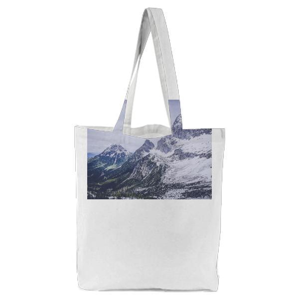 Snow On Gray Black Mountain Range Tote Bag