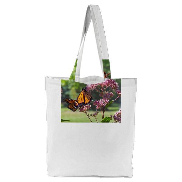 Monarch Butterflies On Pink Petal Flowers During Daytime Tote Bag