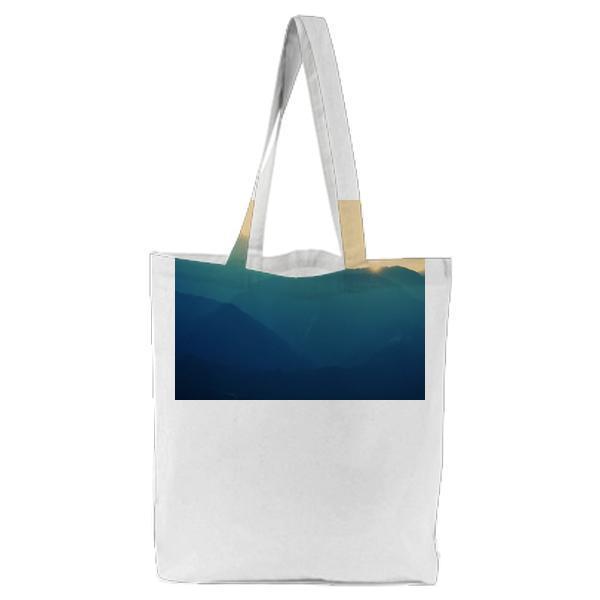 Brown And Black Mountain Under Yellow Sunlight Tote Bag