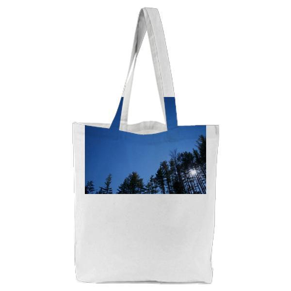 QuotWorms Eye View Of Green Trees Under Blue Clear Night Sky Tote Bag