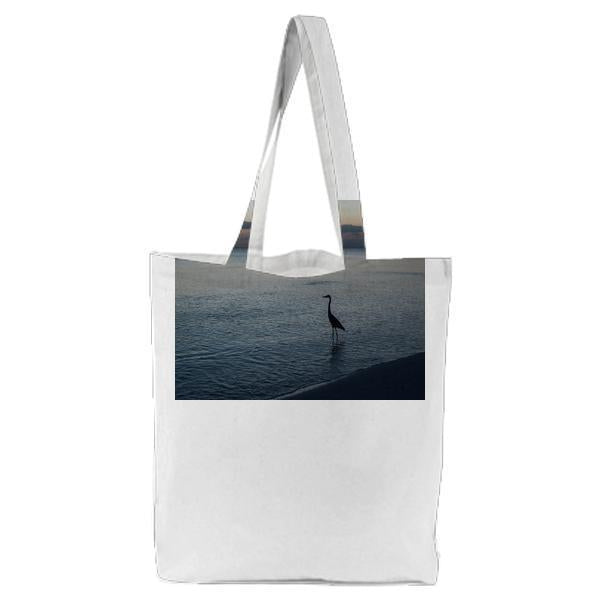 Silhouette Of Duck On Shore During Sunset Tote Bag